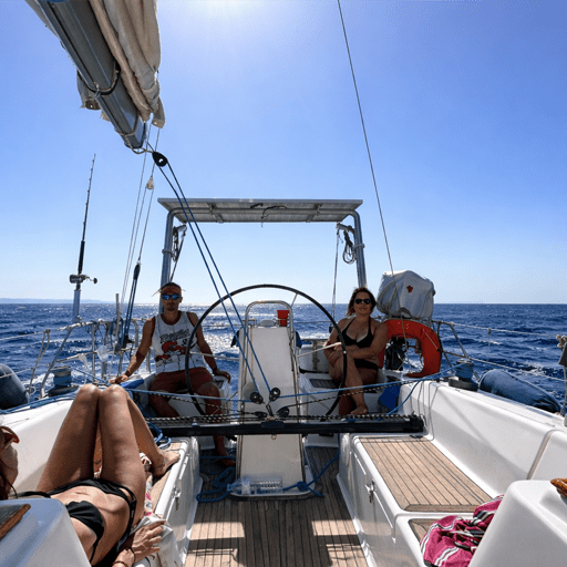Sailing and relaxing onboard during a private sailing experience